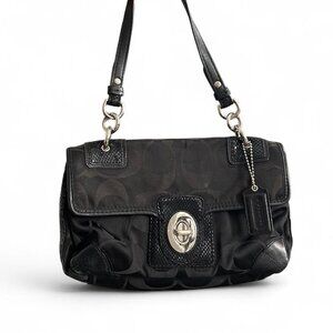 black Coach Peyton Signature Flap shoulder bag with a turn-lock closure  purse